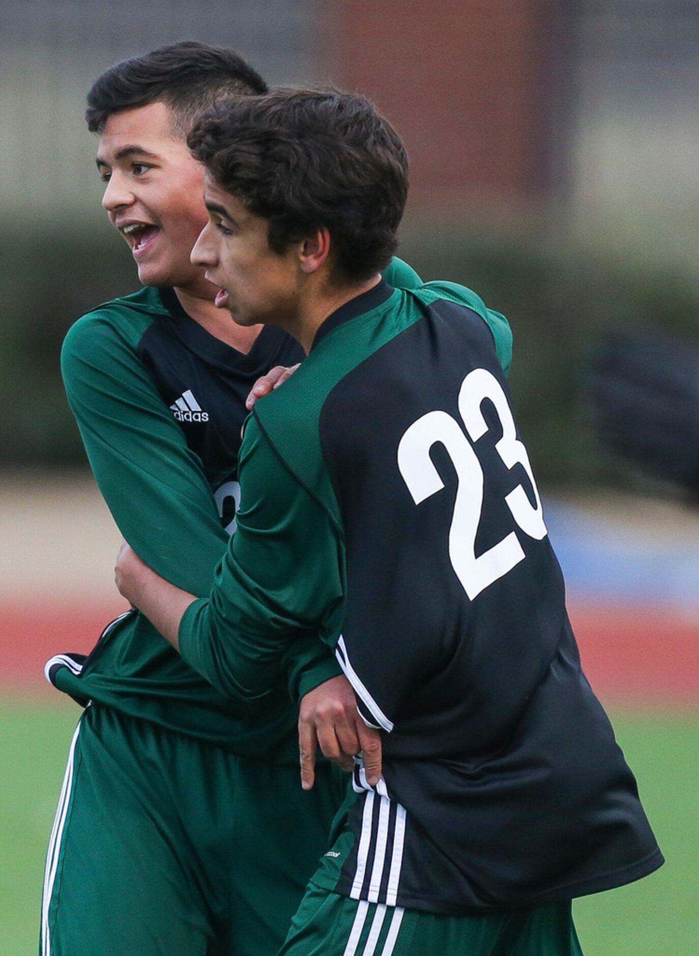 Prosper's Gavyn Rosales (27), left, celebrates with Vicente Garivay (23) after scoring a...