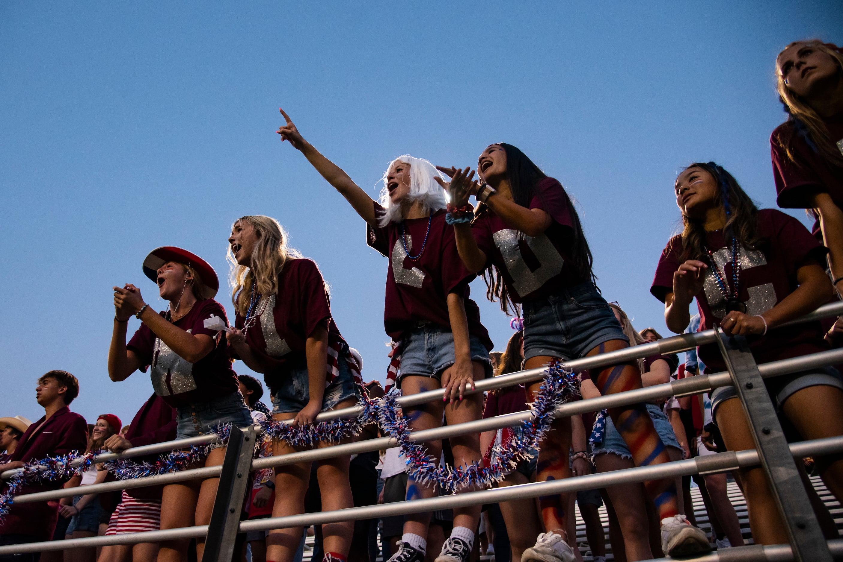 The Plano Senior High School student section gets fired up during a play at Lake HighlandÕs...