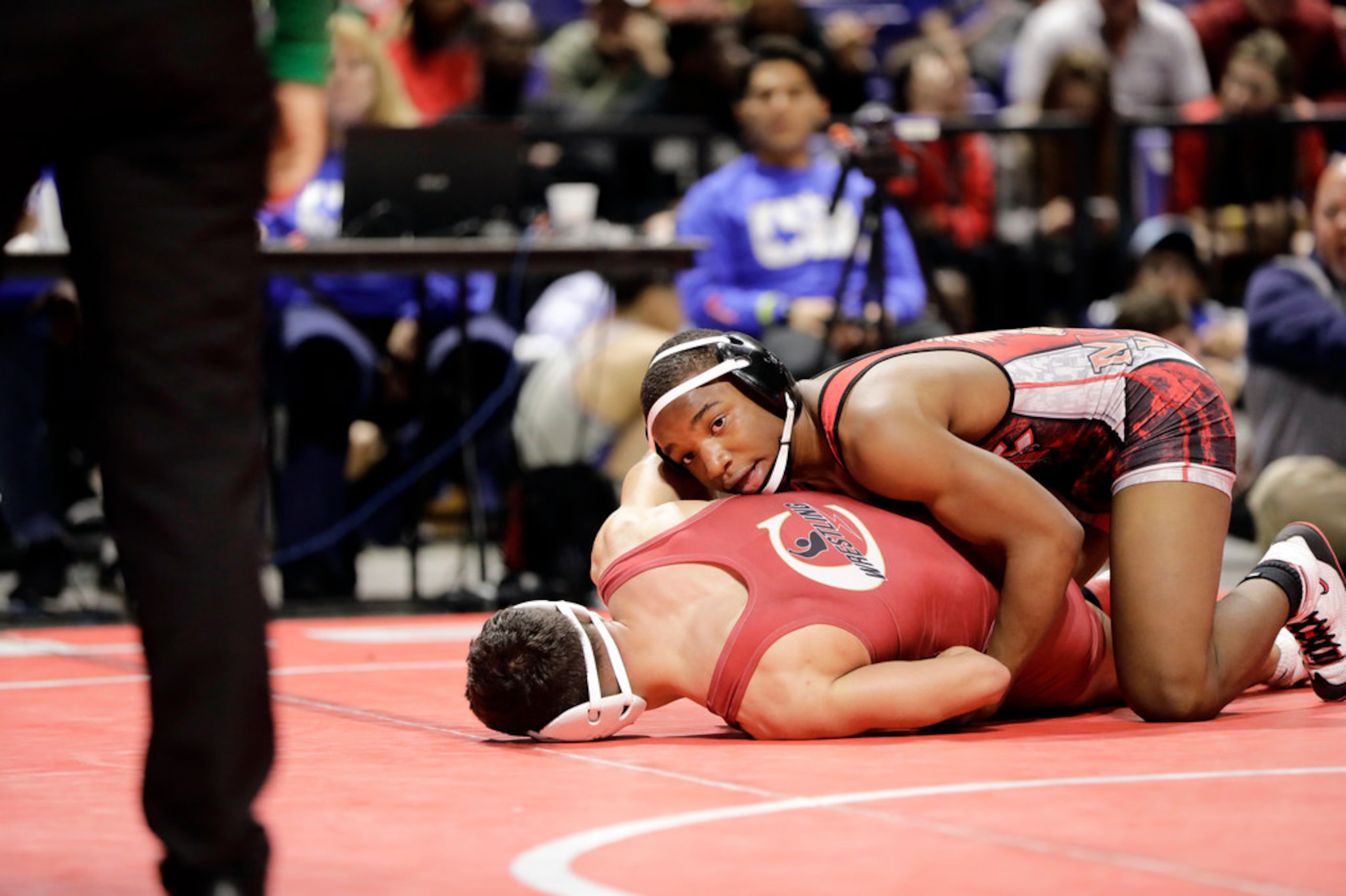 Donovan Whitted of Arlington Martin wrestles during the UIL Texas State Wrestling...