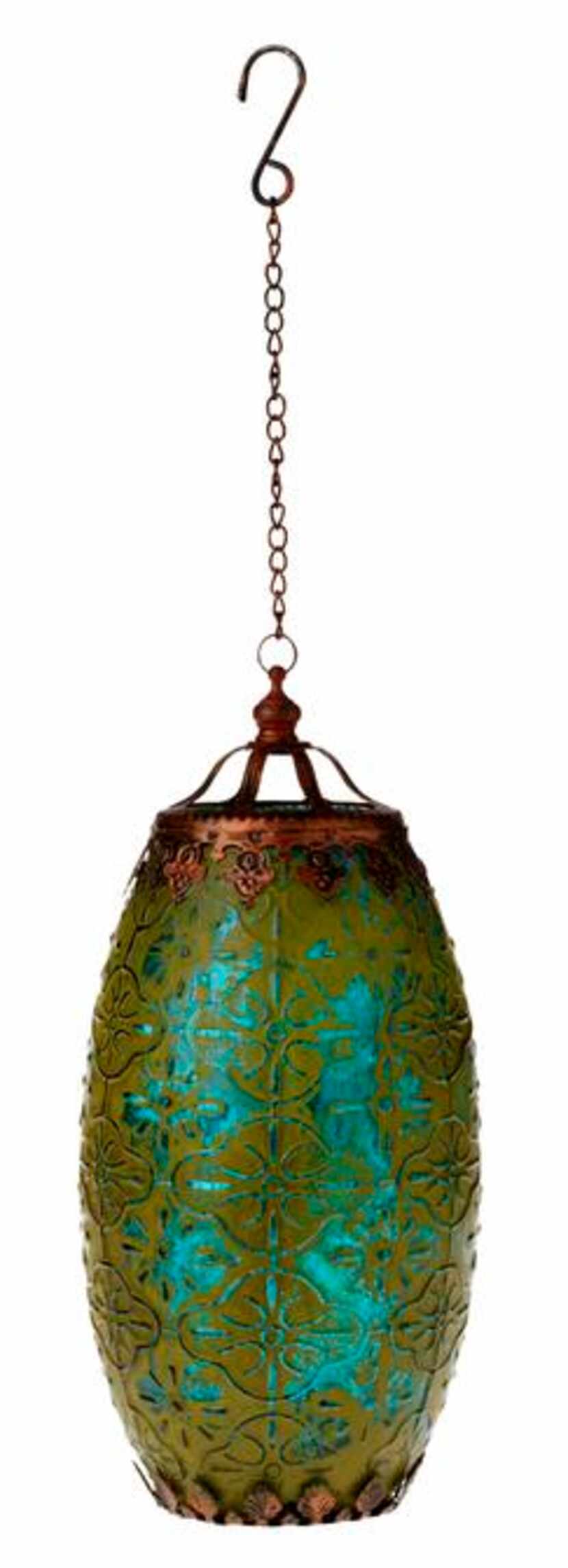 
Boho glow. Light a path with painted mercury glass lanterns strung from hooks. This one...