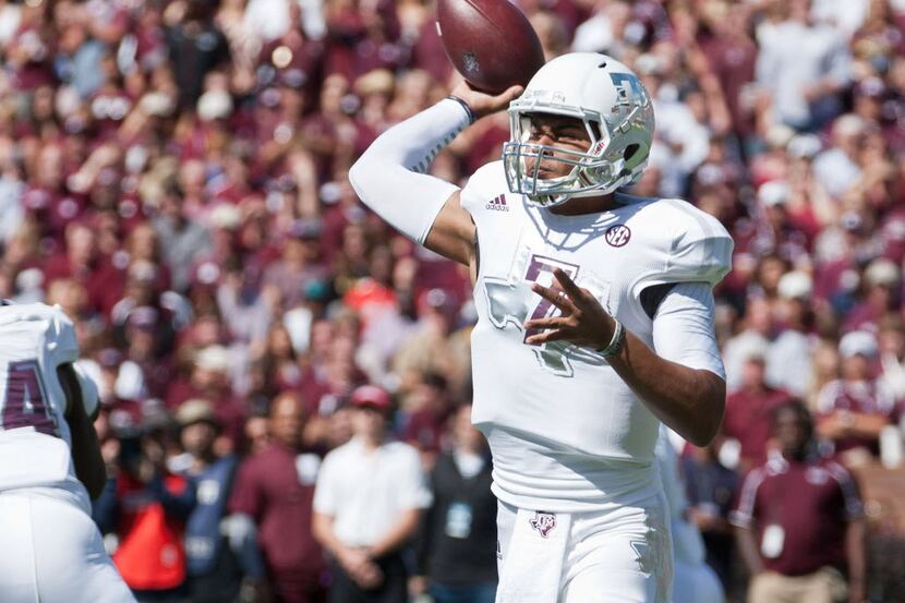 Oct 4, 2014; Starkville, MS, USA; Texas A&M Aggies quarterback Kenny Hill (7) throws the...