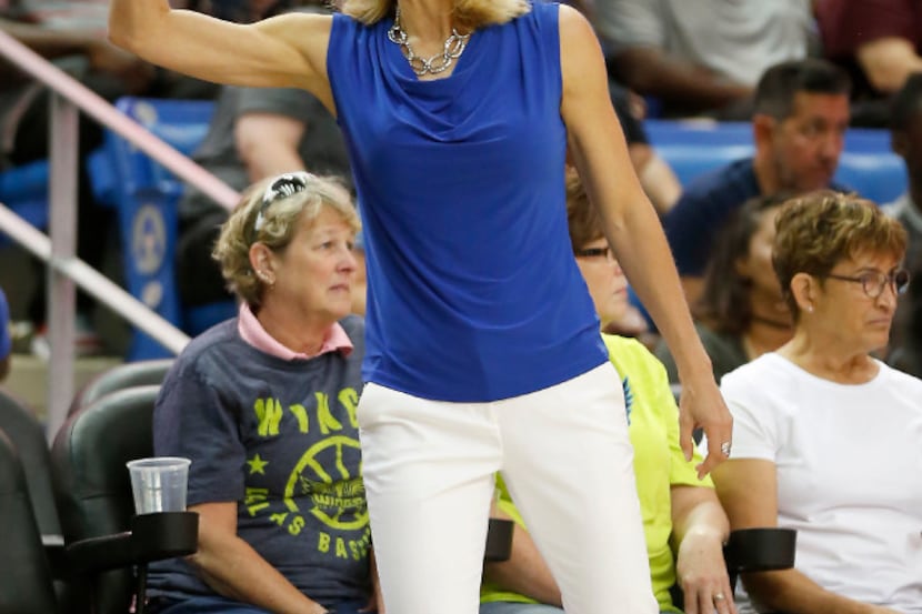 Seattle Storm head coach Jenny Boucek directs her team during the first half against Dallas...