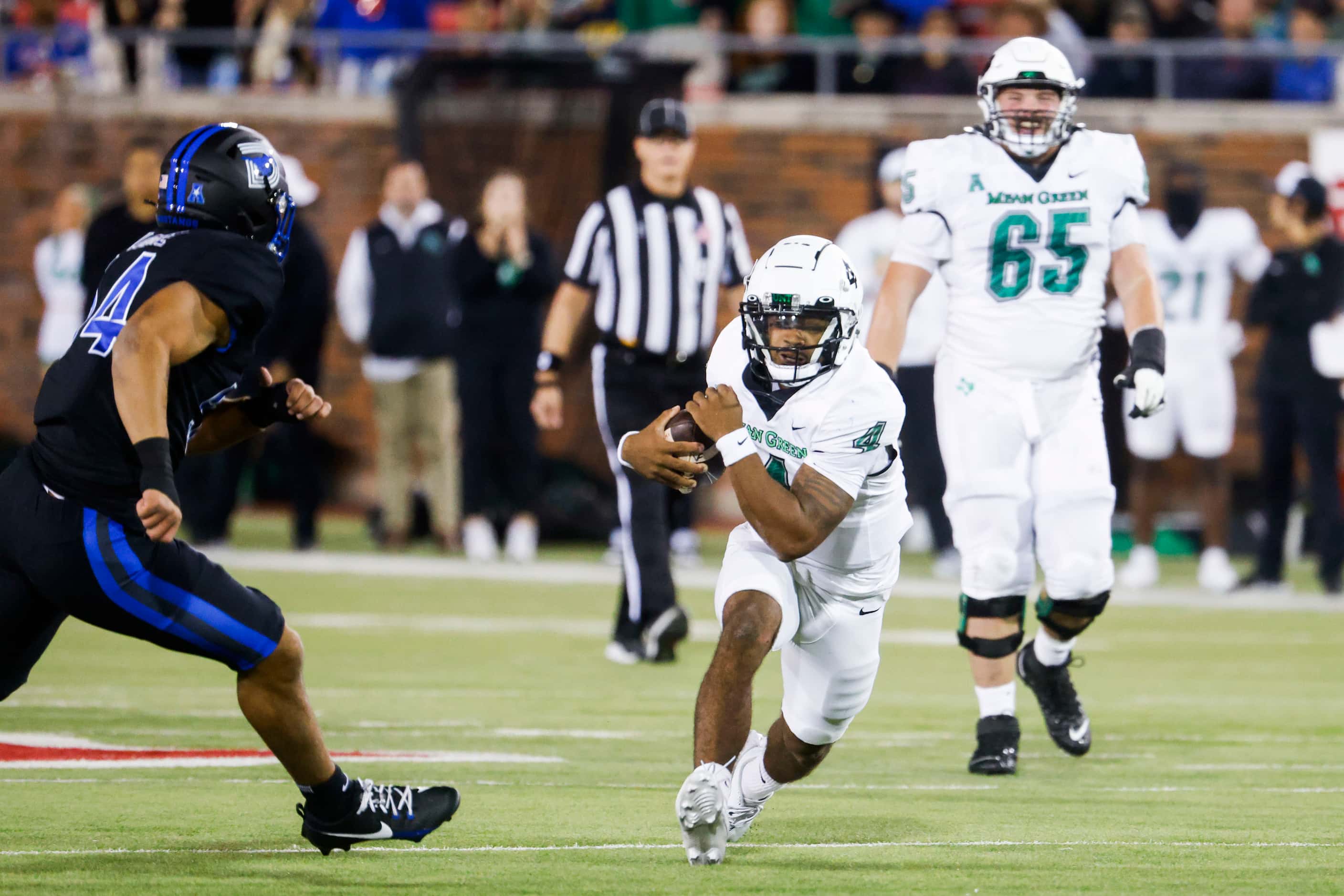 North Texas Mean Green quarterback Chandler Rogers (4) runs with the ball against Southern...