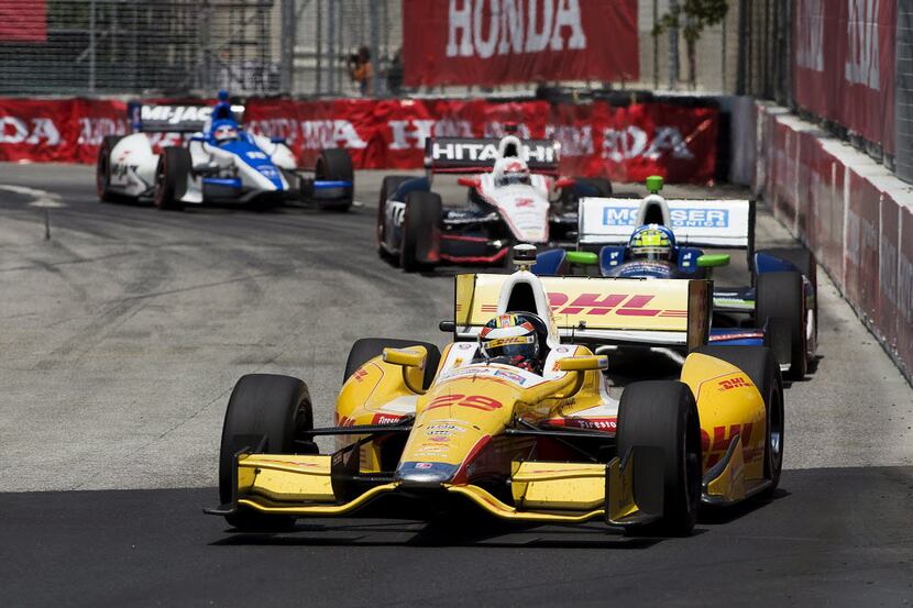 Ryan Hunter- Reay rounds a corner during the IndyCar Series Honda Indy Toronto auto race,...