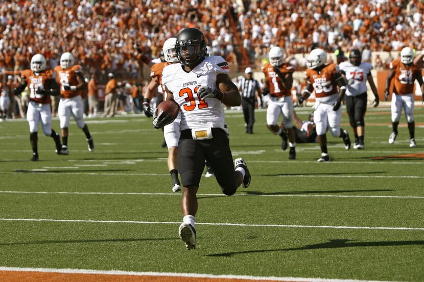 AUSTIN, TX: Oklahoma State running back Jeremy Smith runs for a second quarter touchdown...