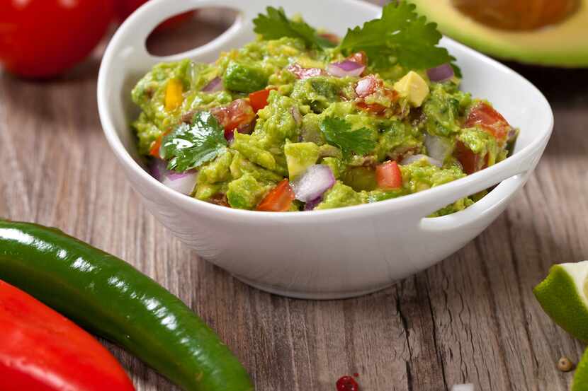 Guacamole con tomato y cilantro. iSTOCK.
