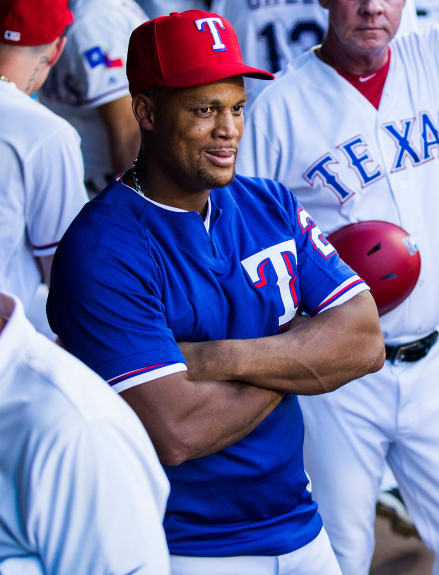 Texas Rangers third baseman Adrian Beltre (29) watches from the dugout during the first...