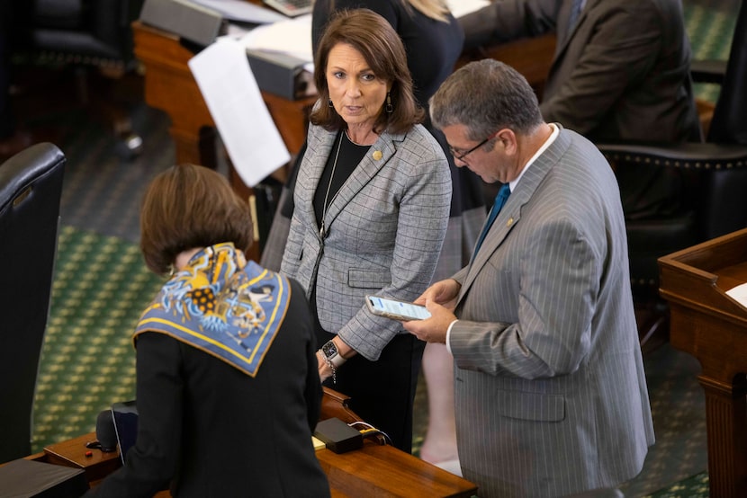 Sen. Angela Paxton (center), R-McKinney, wife of Texas Attorney General Ken Paxton, speaks...