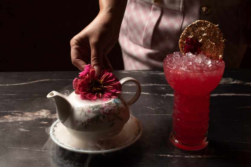 Alexa Rodarte adds finishing touches to a High Tea cocktail at Lexy's, the new Trinity...