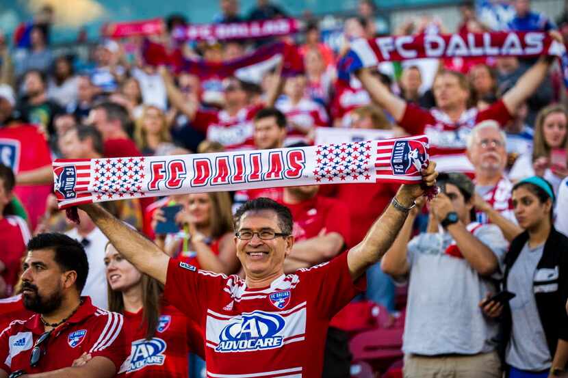 FC Dallas fans cheer from the stands before their game against the Seattle Sounders FC on...