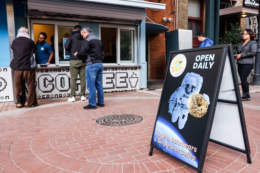 Customers lining up to be served at Starship Bagel in downtown Dallas on Friday, Jan. 20, 2023.