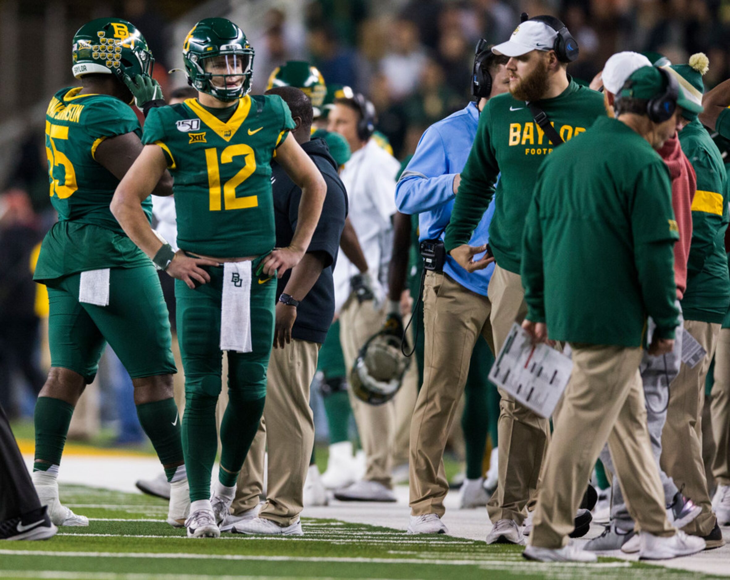 Baylor Bears quarterback Charlie Brewer (12) reacts to an interception that secured a...