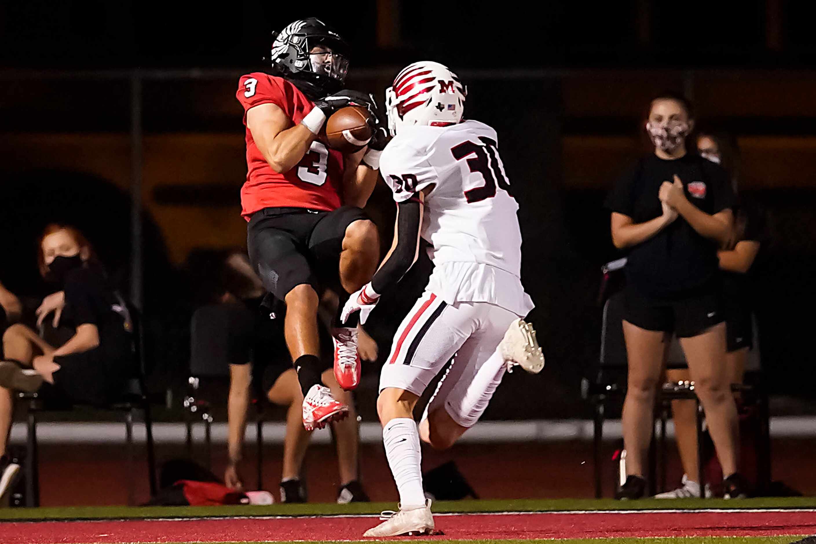 Argyle wide receiver Cash Walker (3) hauls in a 35-yard touchdown reception past Melissa...