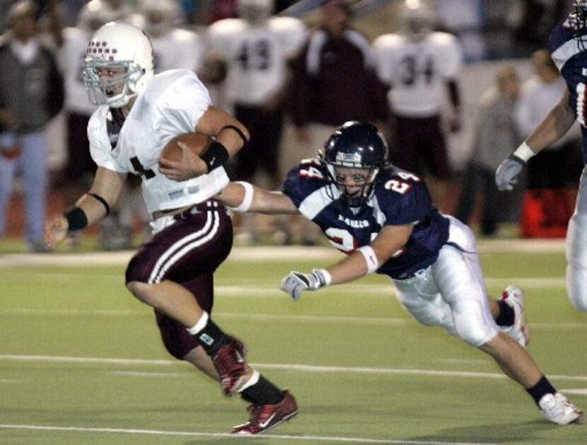 Plano's Mark Sfikas (24) rushes past Allen's Cody Gambill (24) during the first half of a...