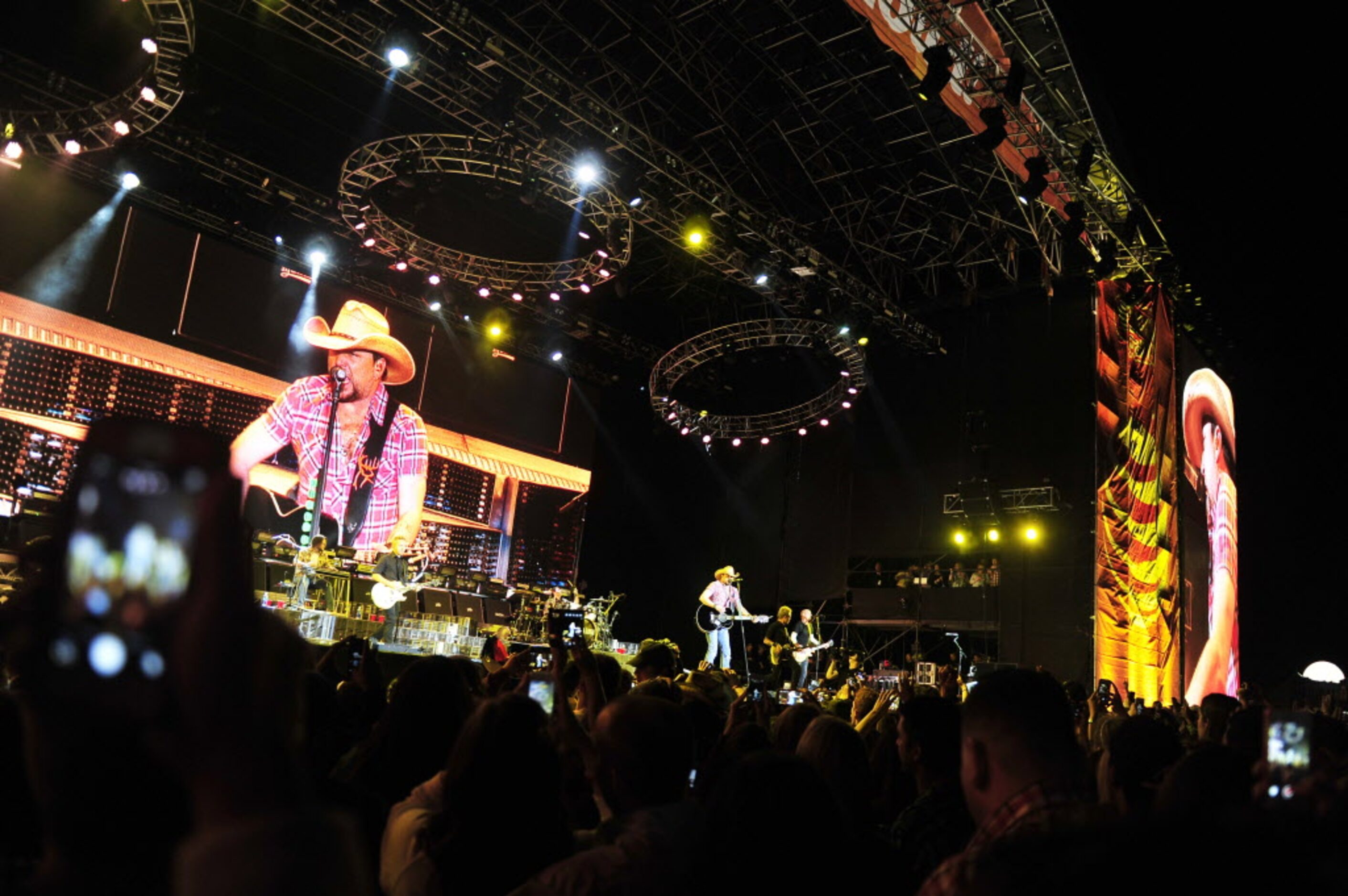 Jason Aldean performs live at the 2014 NCAA March Madness Music Festival during the NCAA...