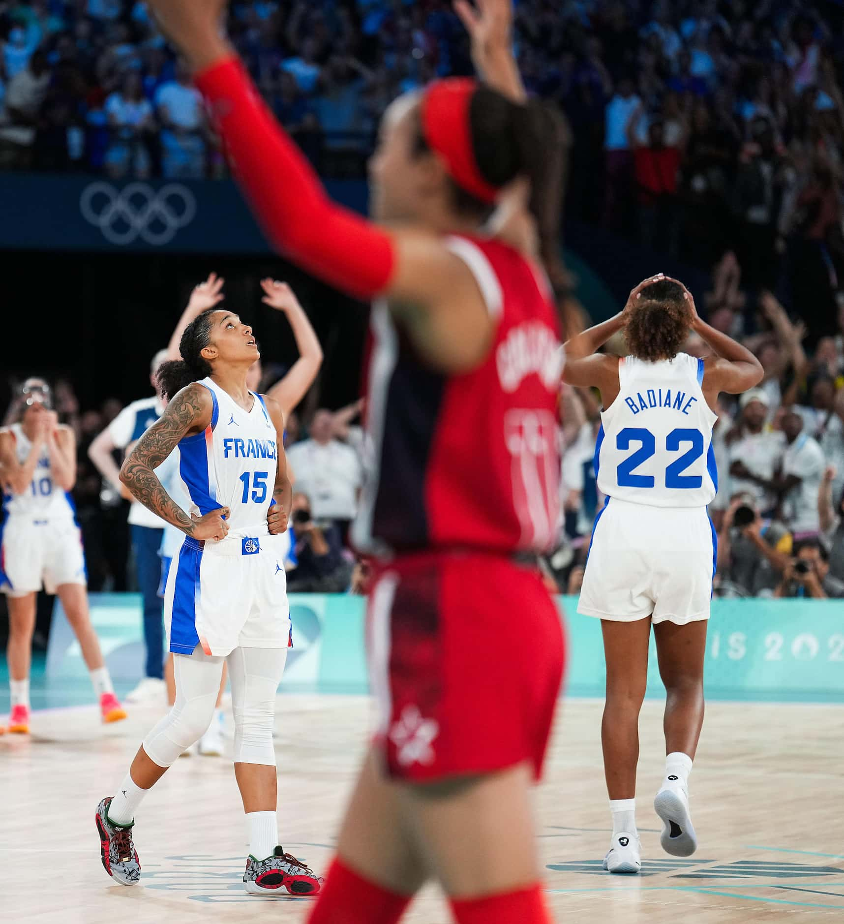 Gabby Williams (15) of France reacts after hitting a buzzer beater as time expired on the...