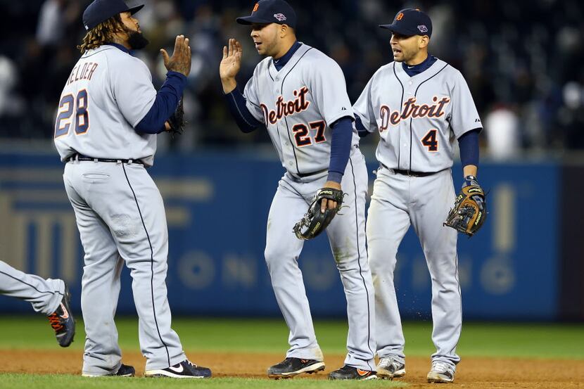 NEW YORK, NY - OCTOBER 13:  (L-R) Prince Fielder #28, Jhonny Peralta #27 and Omar Infante #4...