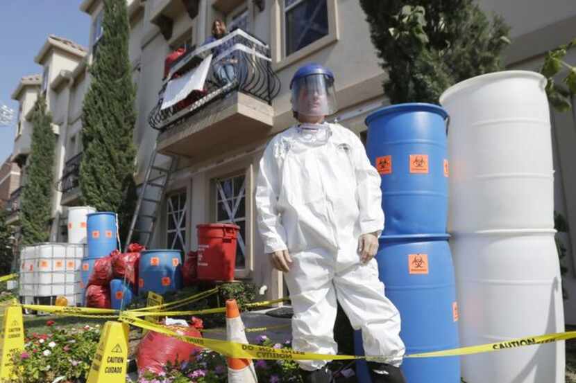
Townhome owner James Faulk, showing off his Ebola-themed display, says he’s just trying to...