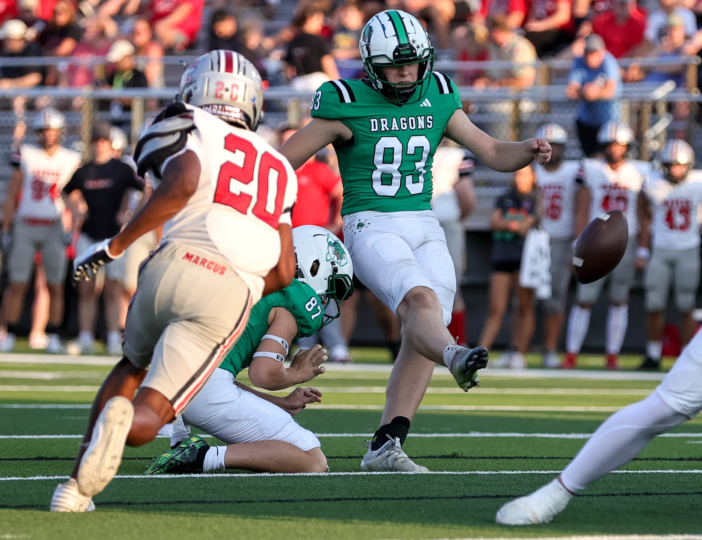 Southlake Carroll Place Kicker Kyle Lemmermann (83) attempts a extra point against Flower...