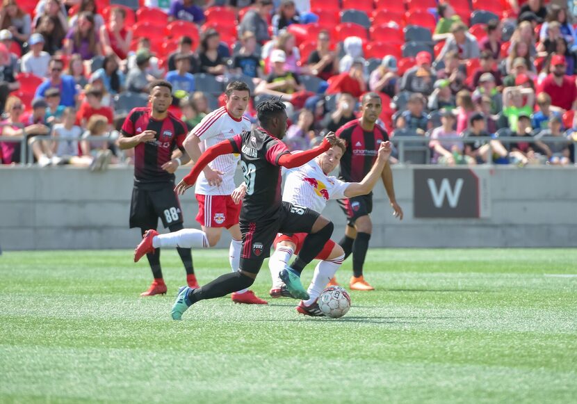 Adonijah Reid tried to dribble past a New York Red Bulls II defender.