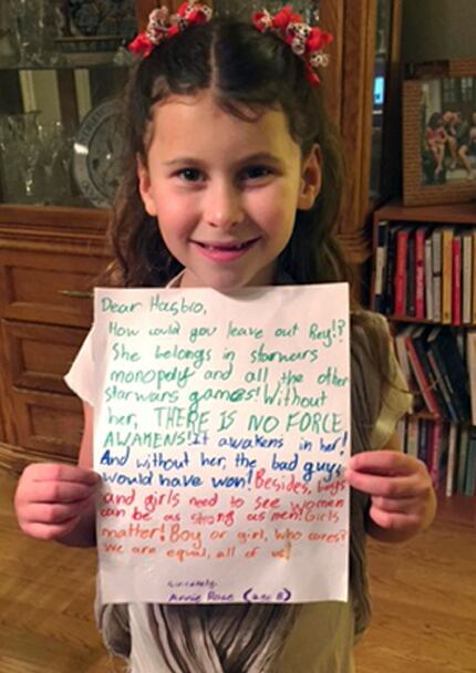 In this January 2016 photo provided by Carrie Goldman, her daughter, Annie Rose, holds a...