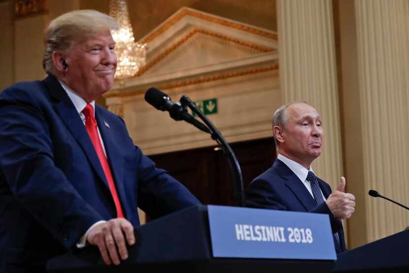 Russian President Vladimir Putin (right) and U.S. President Donald Trump gave a joint news...
