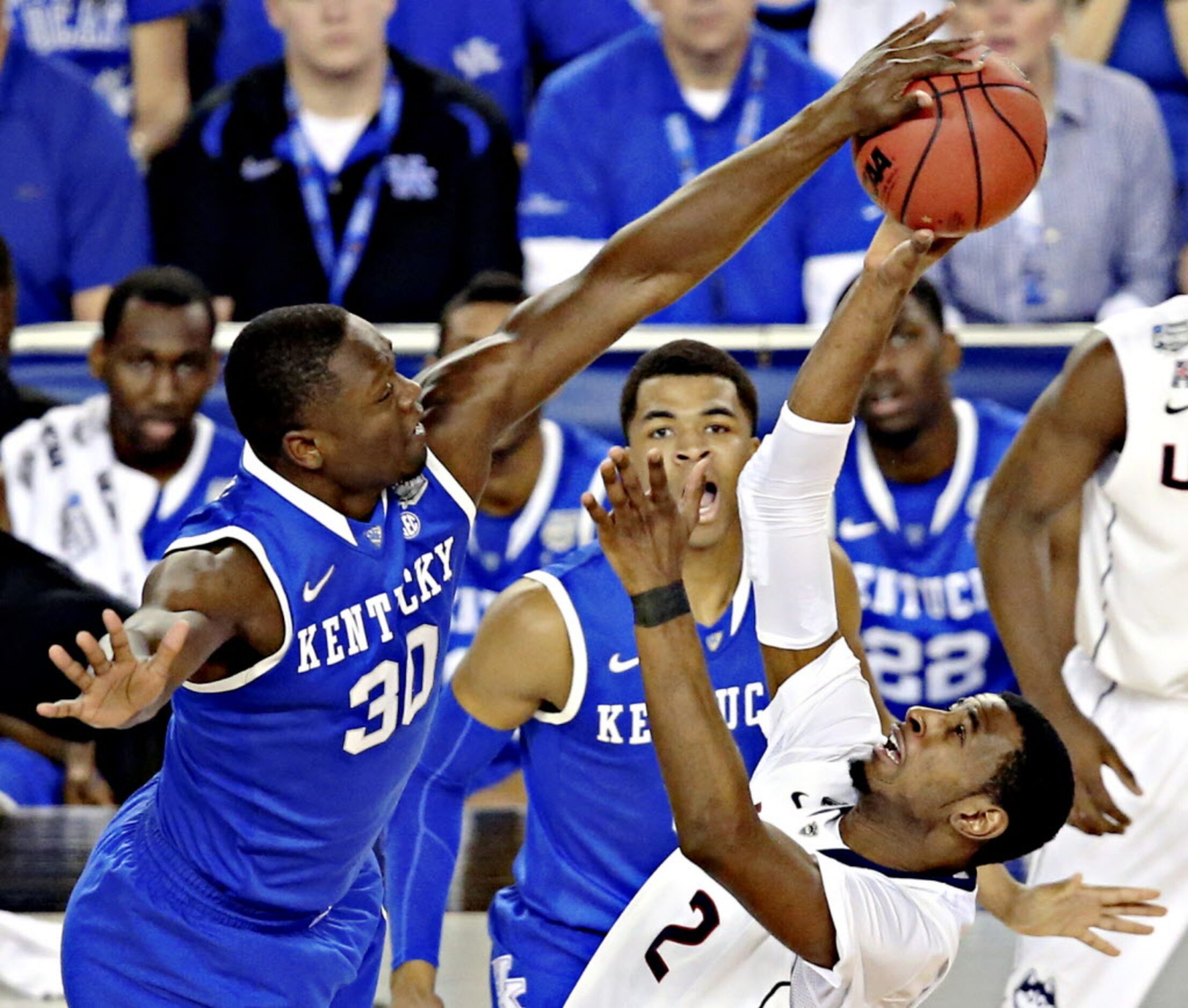 Kentucky Wildcats forward Julius Randle (30) blocks a shot by Connecticut Huskies forward...