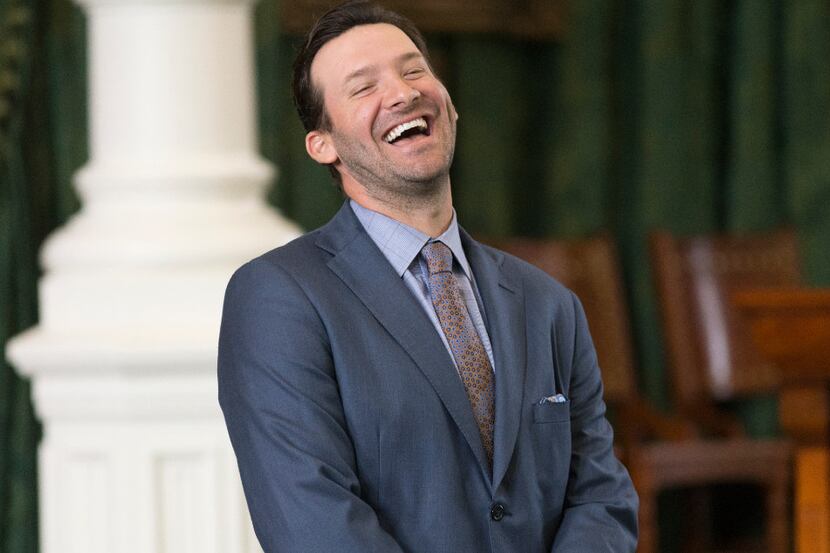 Former Dallas Cowboys quarterback Tony Romo smiles as he is recognized by the Senate at the...
