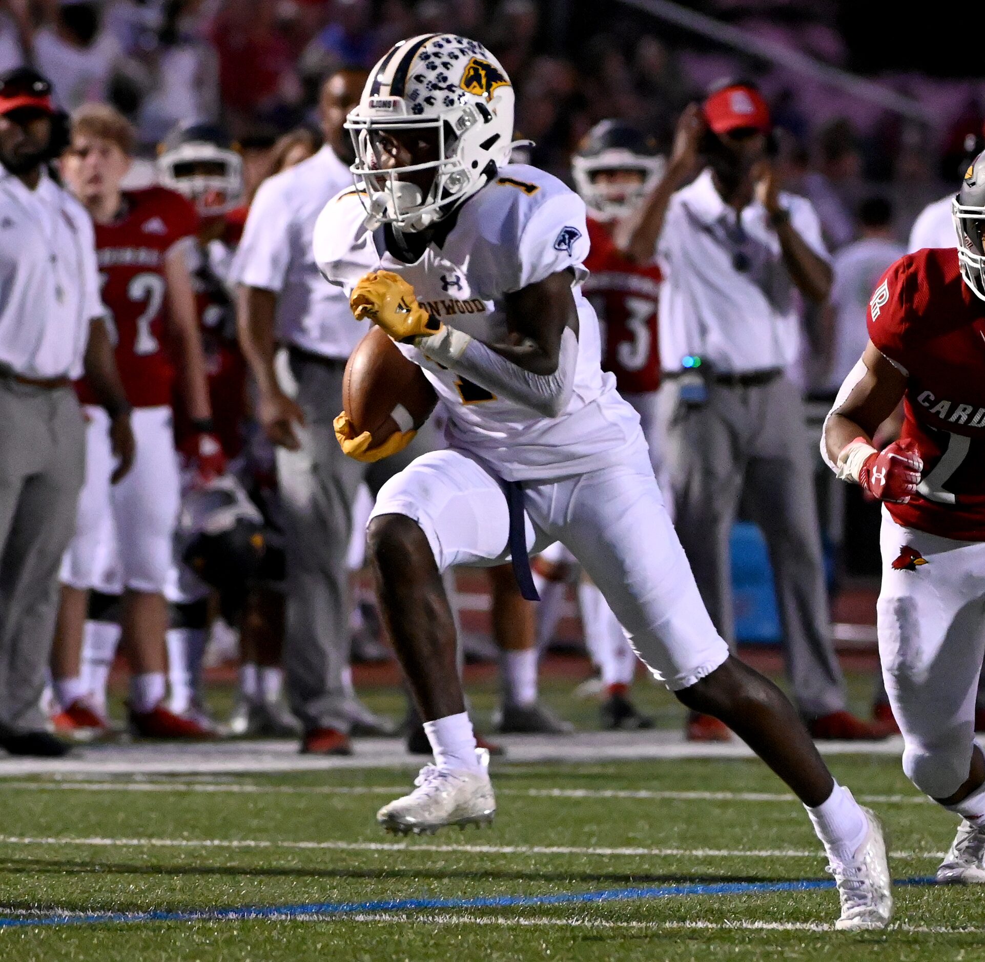 Prestonwood's Nate Stafford (1) runs upfield in the first half of a high school football...