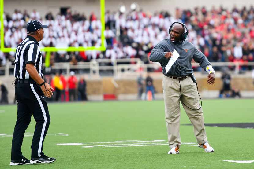 LUBBOCK, TX - NOVEMBER 05: Head coach Charlie Strong of the Texas Longhorns argues a call...