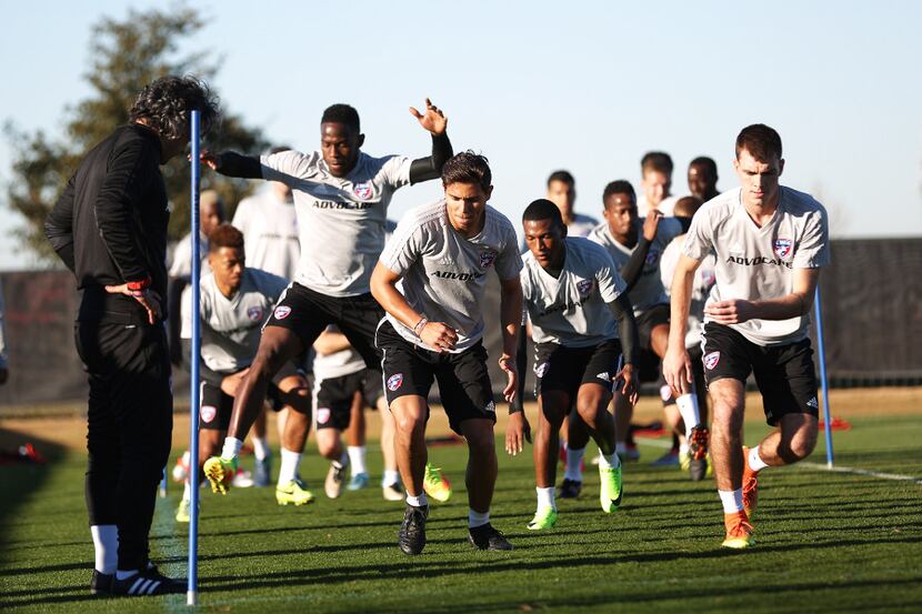 FC Dallas players train as coaches watch on in preparation for the beginning of the season,...