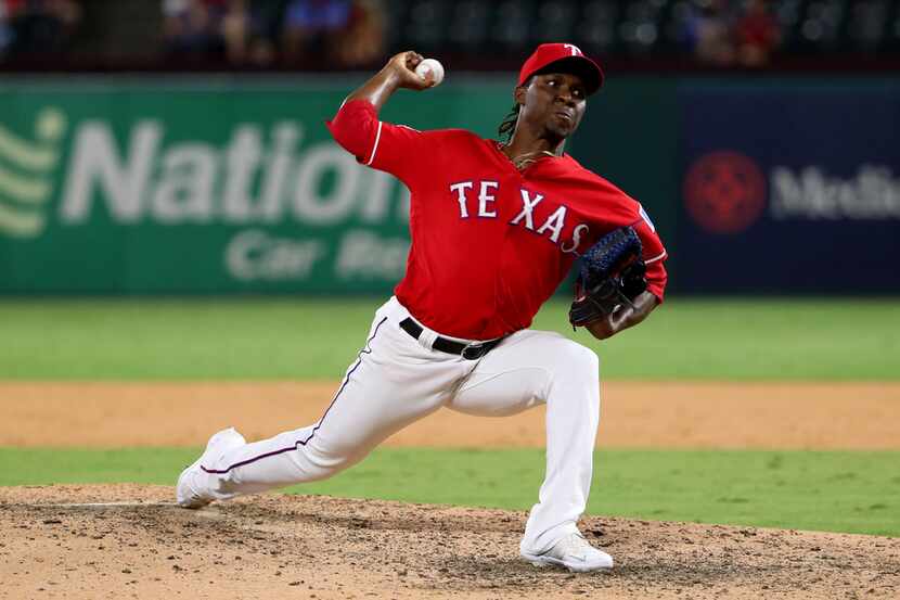 ARLINGTON, TEXAS - SEPTEMBER 24: Rafael Montero #48 of the Texas Rangers pitches against the...