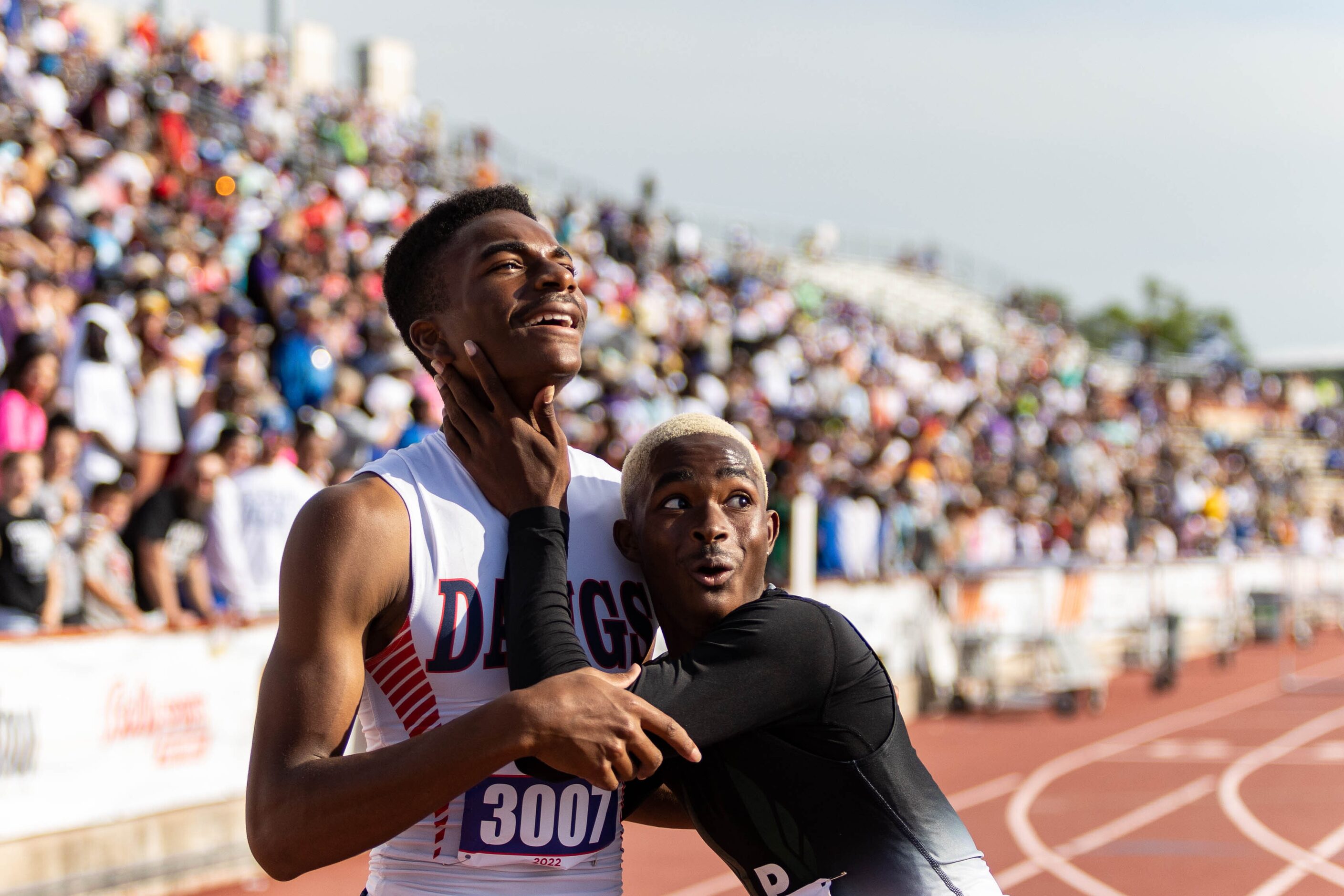 Kody Blackwood of McKinney North and Kendrick Smallwood of Mesquite Poteet embrace after the...