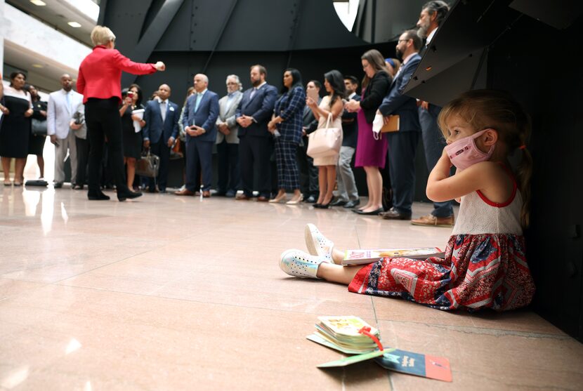 Lark Kennedy Zwiener, the daughter of Texas state Rep. Erin Zwiener, D-Driftwood, reads as...