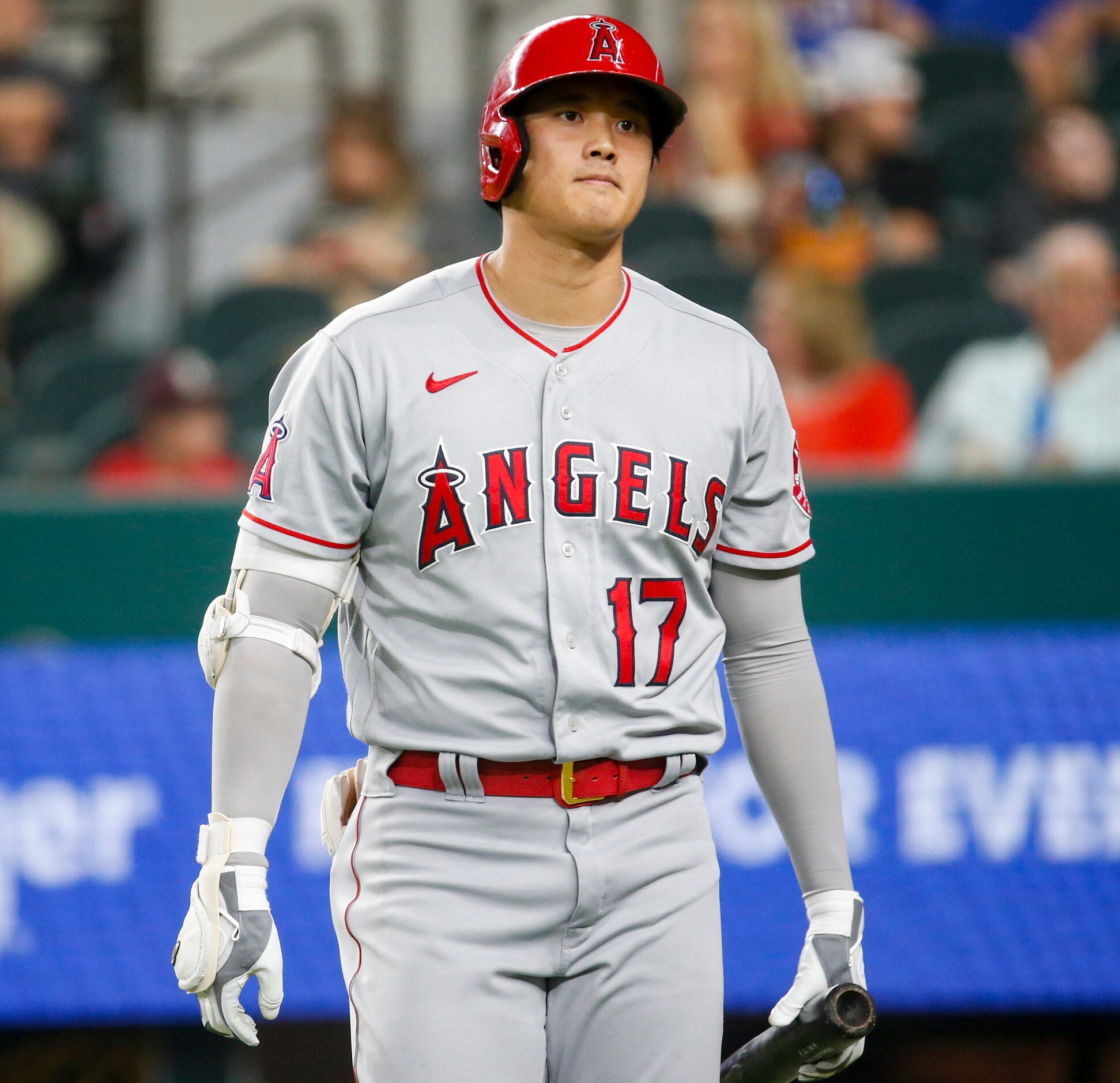 Los Angeles Angels designated hitter Shohei Ohtani (17) walks off the field after striking...