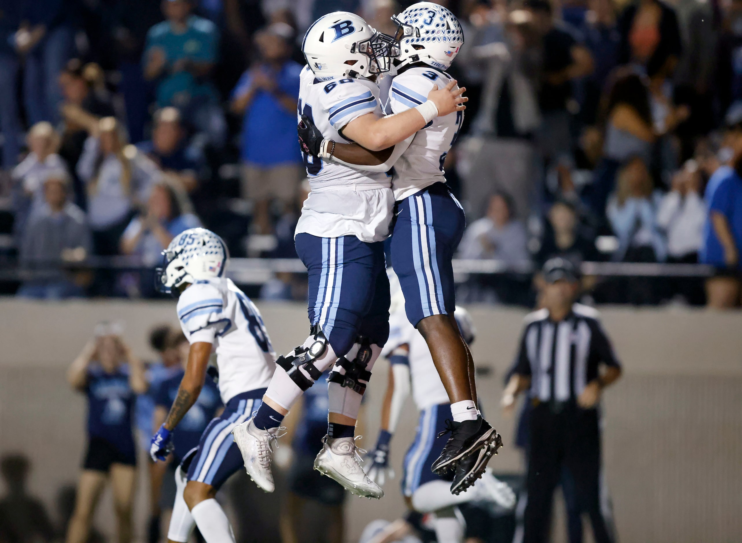 Hurst L.D. Bell running back Jalen David (3) is congratulated on his second half touchdown...