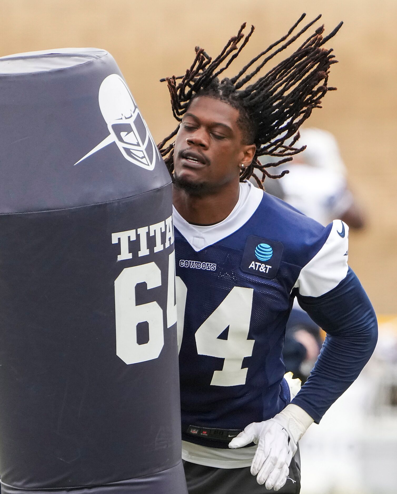 Dallas Cowboys defensive end Randy Gregory (94) runs a drill during a practice at training...