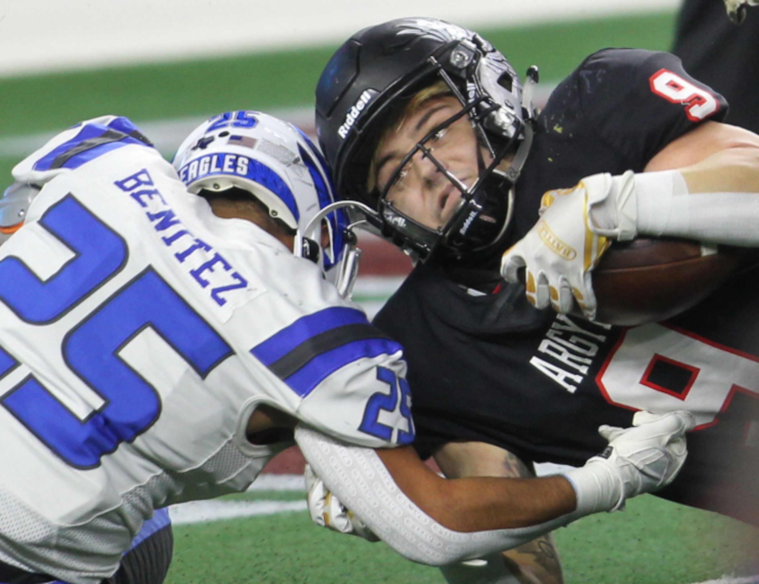 Argyle running back Tito Bice (9) drives with his lower body as Lindale linebacker Daniel...