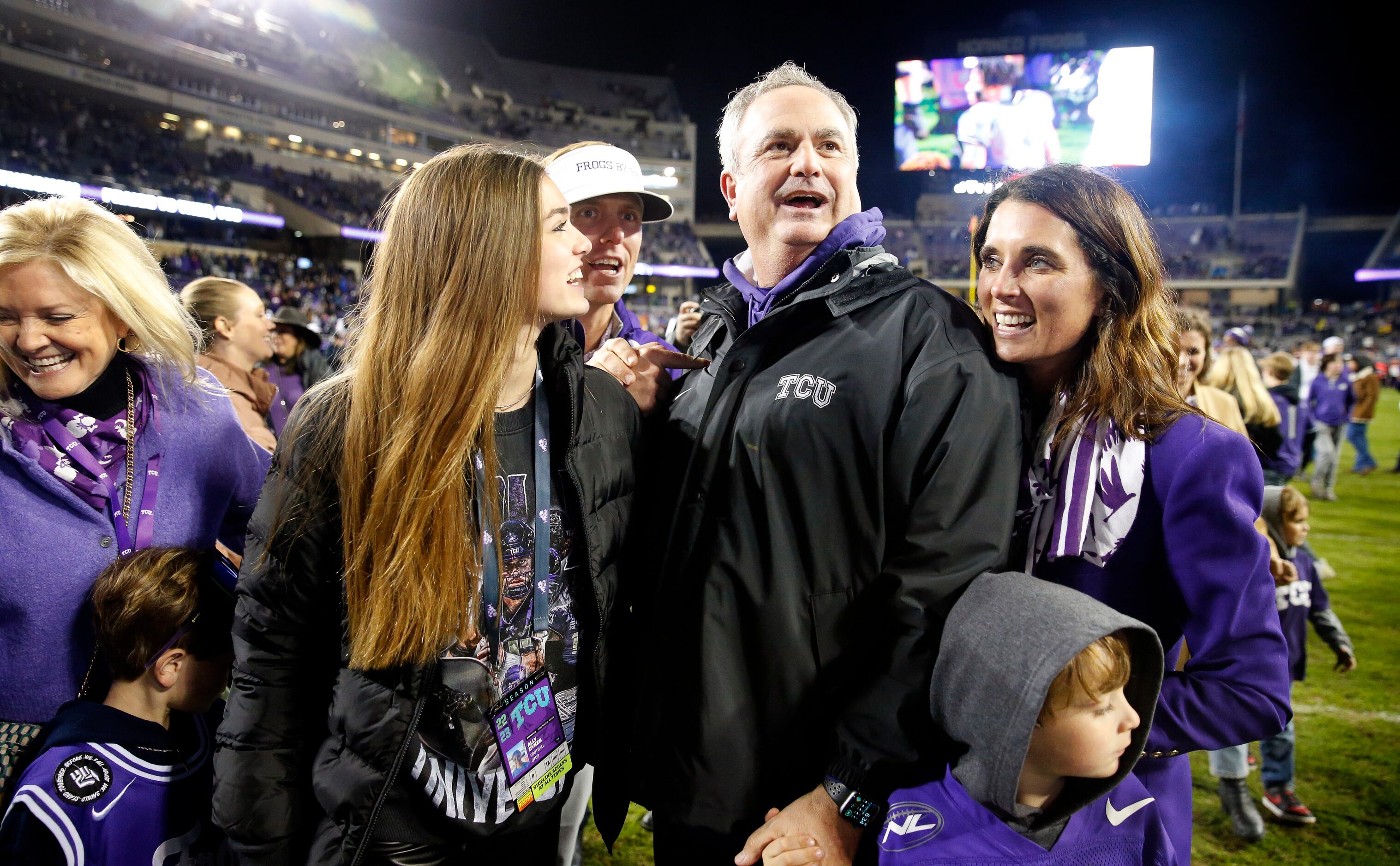 TCU Horned Frogs head coach Sonny Dykes celebrates the team's 62-14 win with family at Amon...