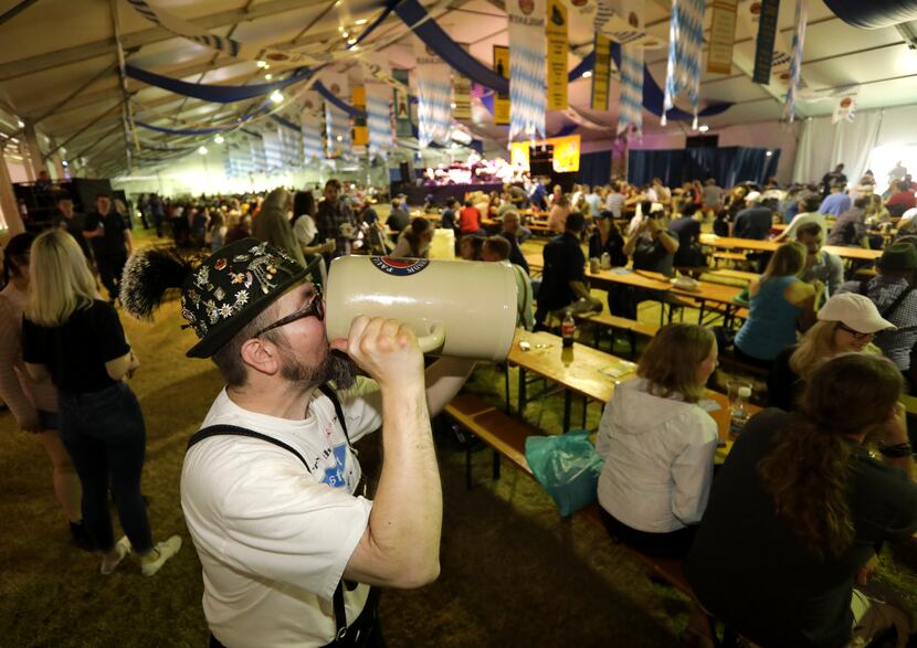 Vinnie Inglhofer drinks from his huge beer stein during the 2018 Addison Octoberfest in...