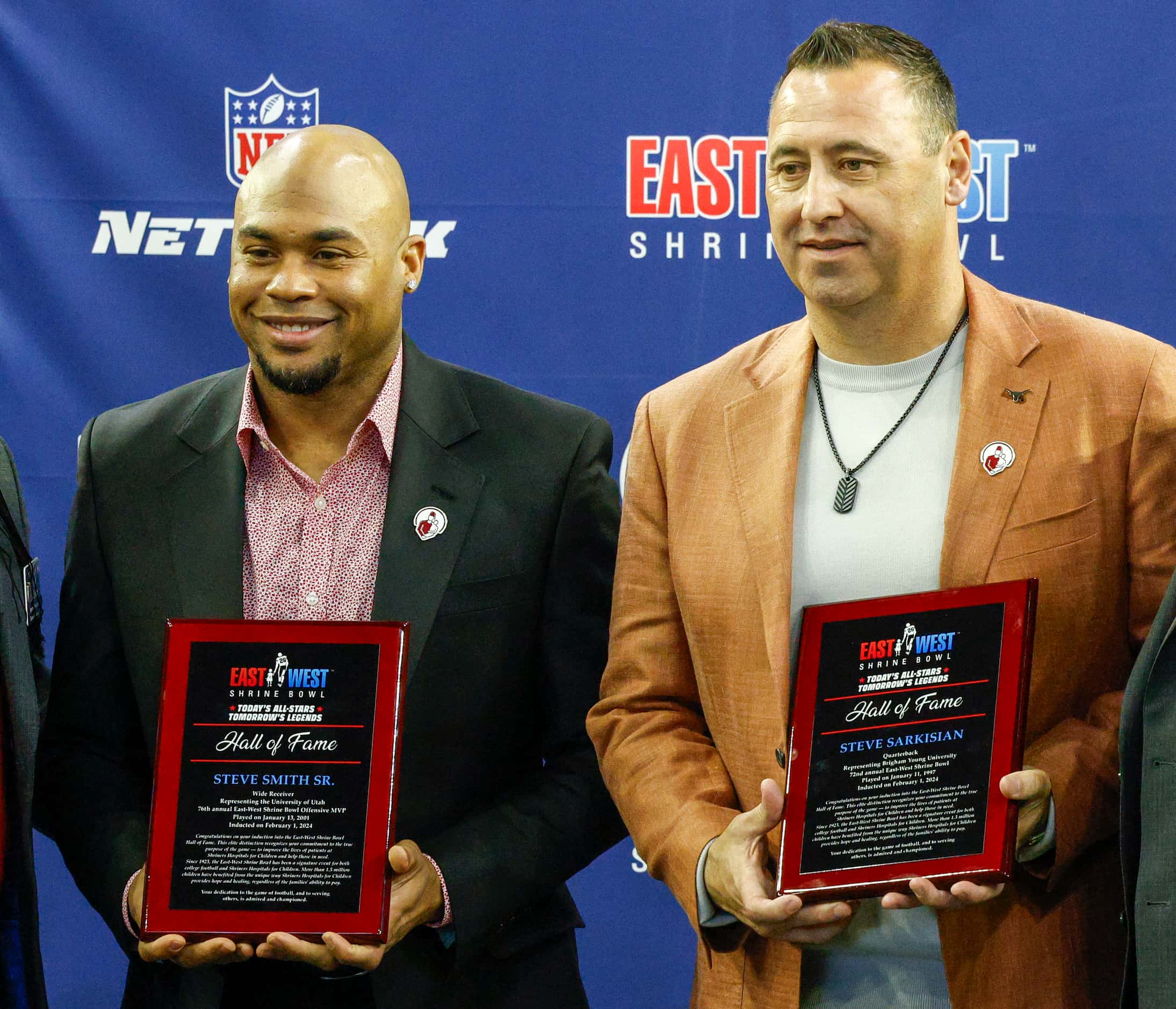 Former NFL wide receiver Steve Smith Sr.(left) and Texas Longhorns head coach Steve...