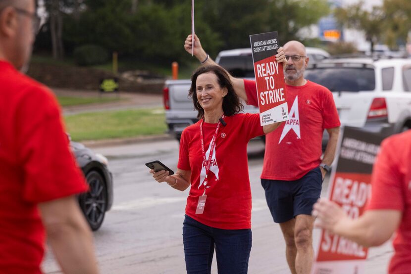 Julie Hedrick (center), president at Association of Professional Flight Attendants and also...