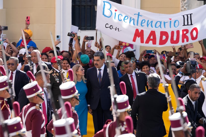 El presidente venezolano, Nicolás Maduro, y su esposa Cilia Flores llegan a la Asamblea...