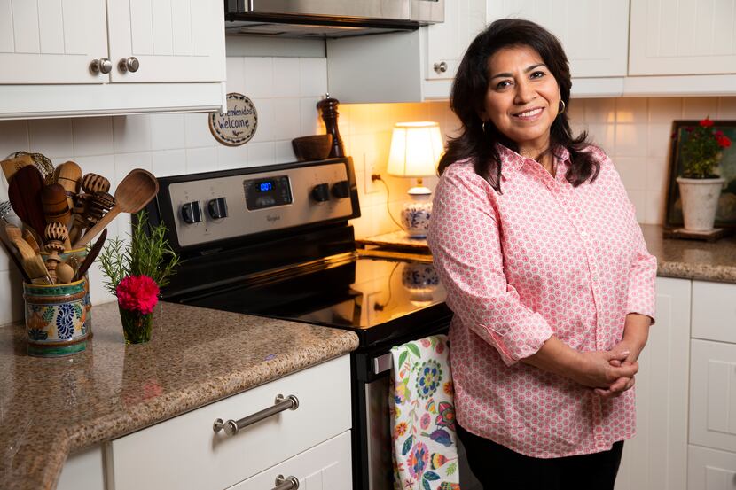 Local author Mely Martínez poses for a photo in her kitchen on Sept. 10, 2020 in Frisco.