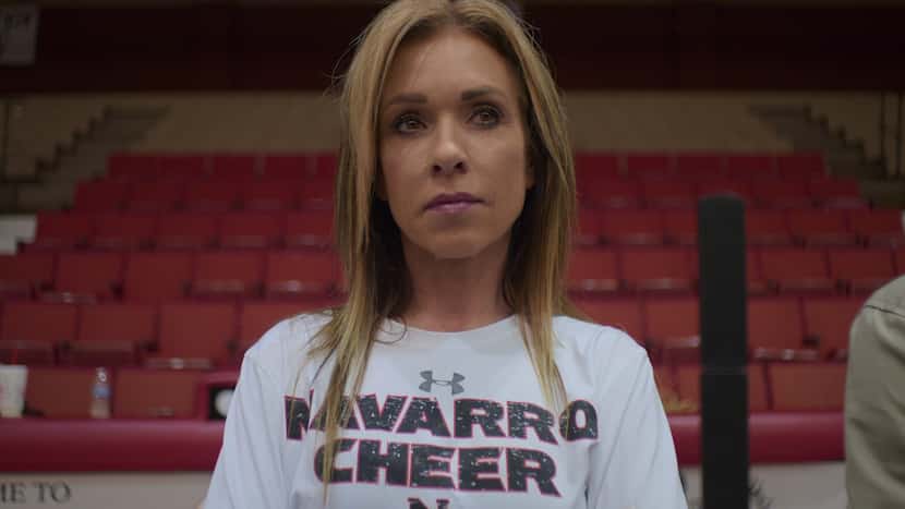 Navarro cheer coach Monica Aldama encouraged squad members to think of her as "a mom."