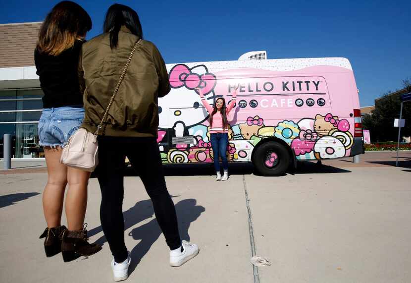 Fans posed for pictures with the Hello Kitty food truck at The Shops at Willow Bend in...