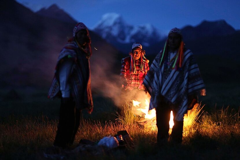 Andean farmers take part in a ceremony honoring Mother Earth and Father Snowy Mountain, in...