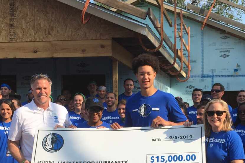 Rookie Isaiah Roby joined Mavericks employees on Thursday to help build a Habitat for...