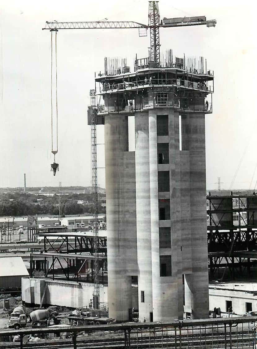 Reunion Tower began to take shape as construction workers pushed for the 500-foot mark. 