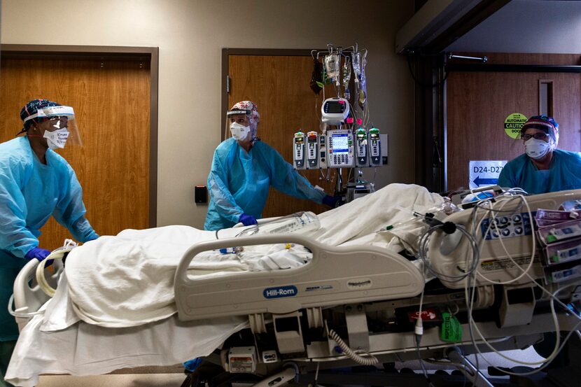 From left, nurses Keyara Freeman and Madisen Stacks and respiratory therapist Shannon Harden...